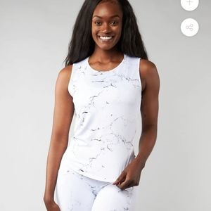 Limitless Flow Top
-
White Marble